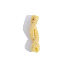 Load image into Gallery viewer, a single piece of yellow pasta with green specks in a helix shape
