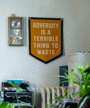 Load image into Gallery viewer, Oxford Pennant - Adversity Is A Terrible Thing To Waste Camp Flag • Unreasonable Hospitality x Oxford Pennant
