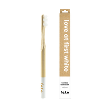 Load image into Gallery viewer, from earth to earth USA - F.e.t.e | Adult's Medium Bamboo Toothbrush

