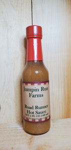 glass bottle of Road Runner Hot Sauce