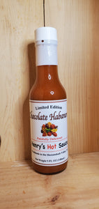glass bottle of chocolate habanero hot sauce