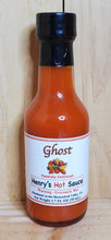 Load image into Gallery viewer, small glass bottle with red hot sauce in it of ghost pepper sauce
