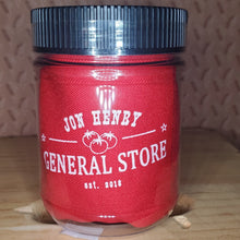 Load image into Gallery viewer, jar featuring a red canvas bag saying jon henry general store
