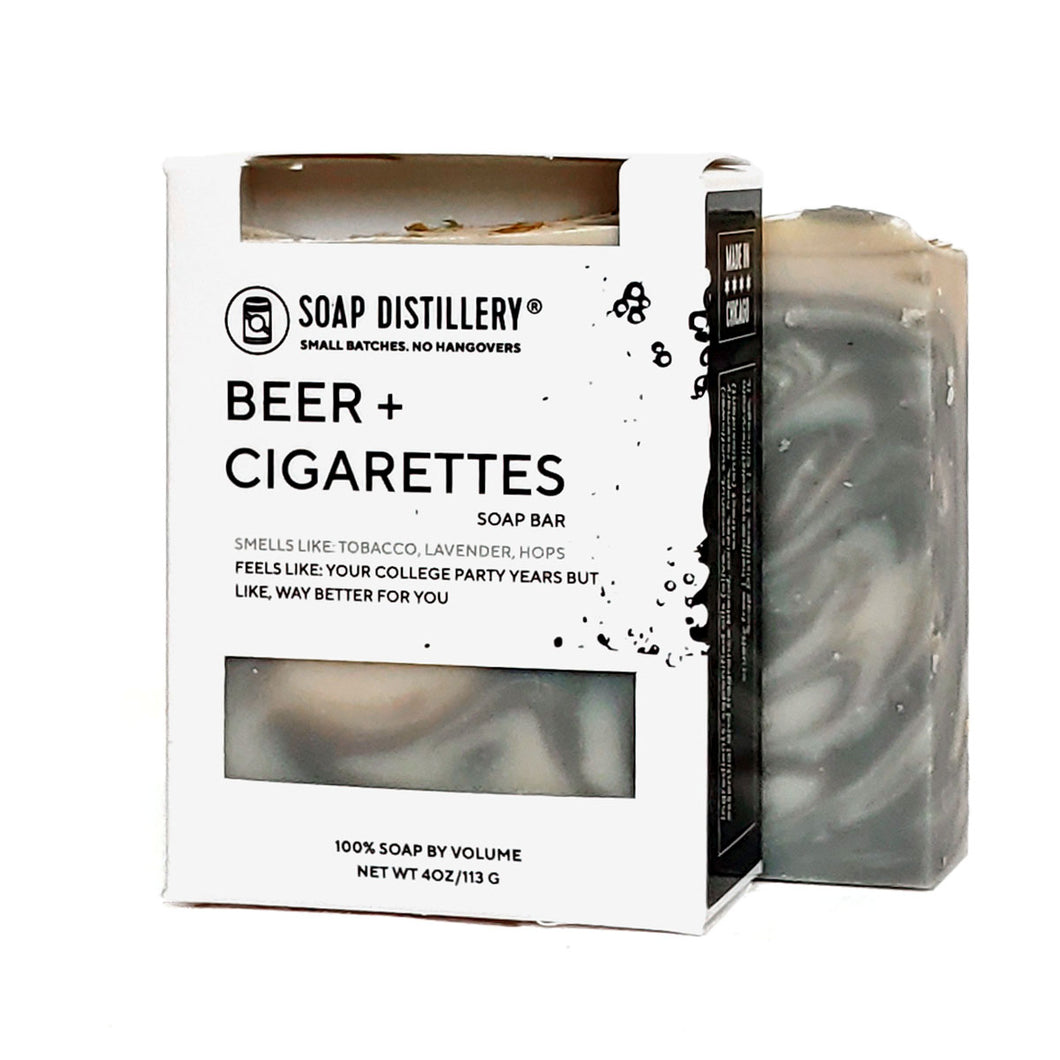a black swirl bar of soap saying beer and cigarettes smell