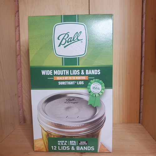 green box of wide mouth lids and bands made by ball 12 lids and bands suretight