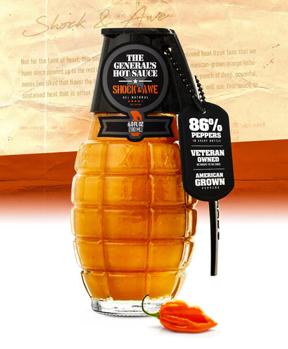 hand grenade of orange hot sauce