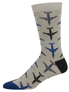green socks with black, gray and blue jet planes on them. black heal