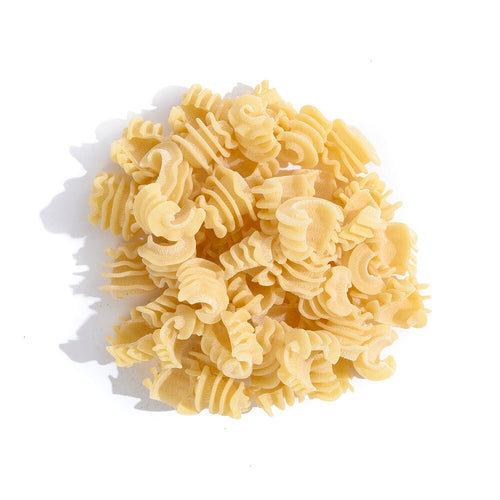 a pile of pasta with ridges around it